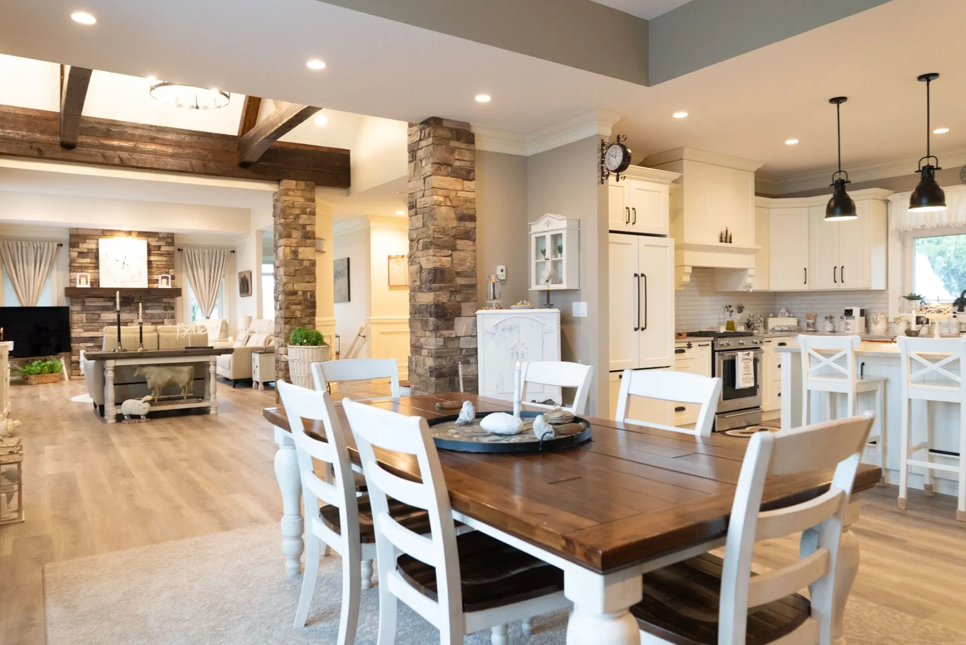 Sage green kitchen with white quartz counters by Master Painting & Renovations