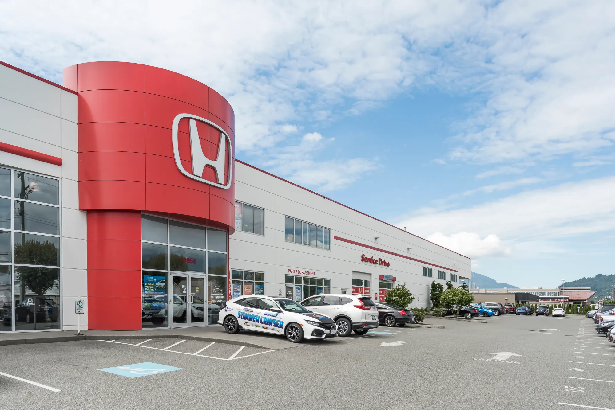 Commercial exterior painting for Murray Honda completed by Master Painting & Renovations