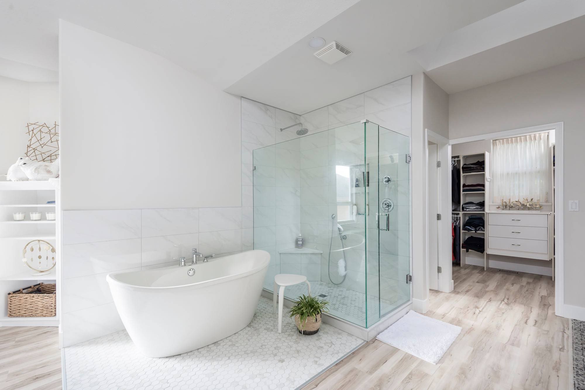 Elegant bathroom with freestanding tub and glass shower