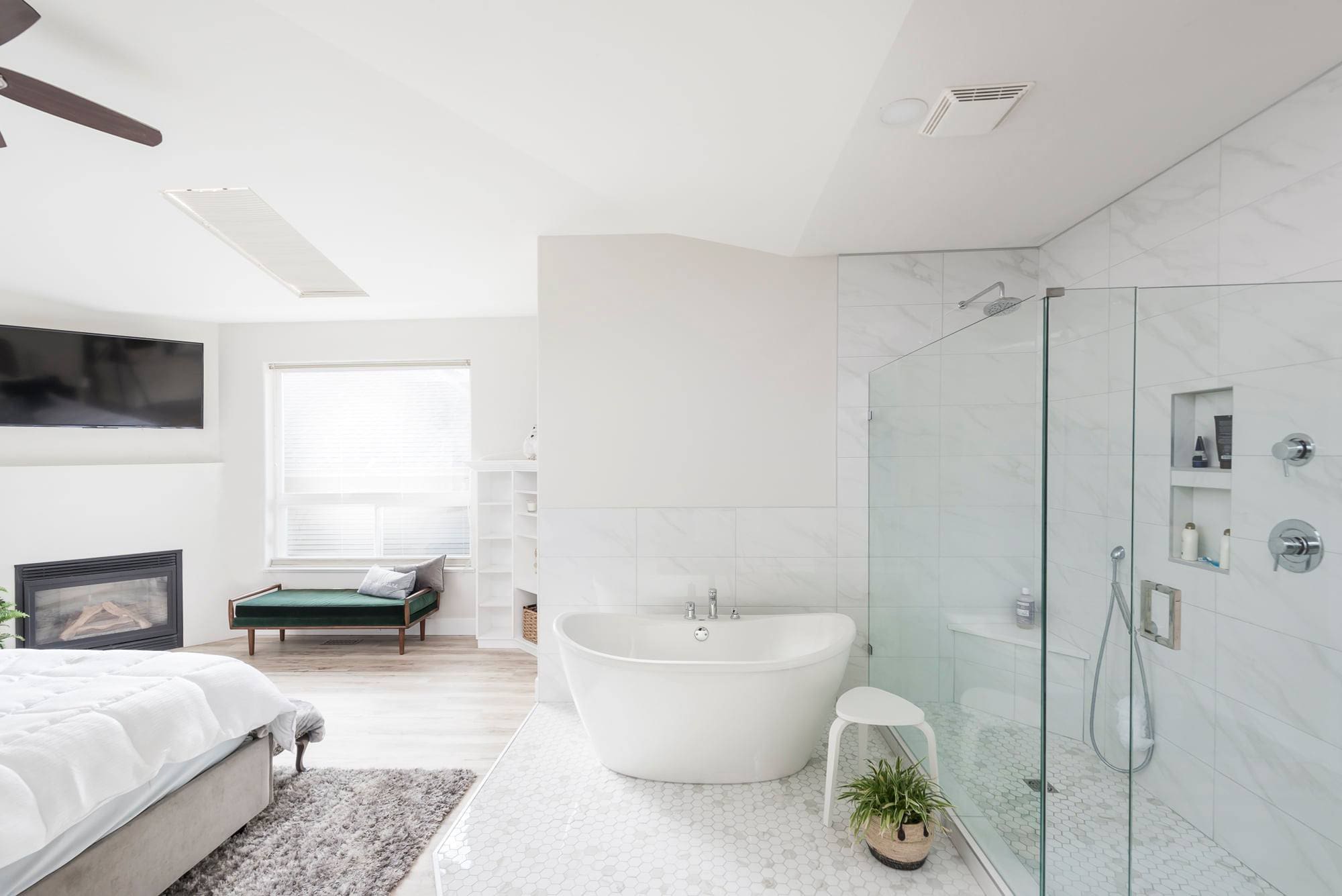 Master suite with soaking tub and fireplace