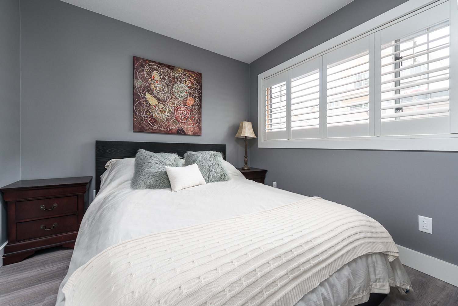 Cozy bedroom with gray walls