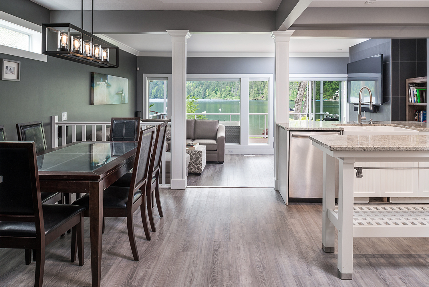 Open concept dining and kitchen with lake view