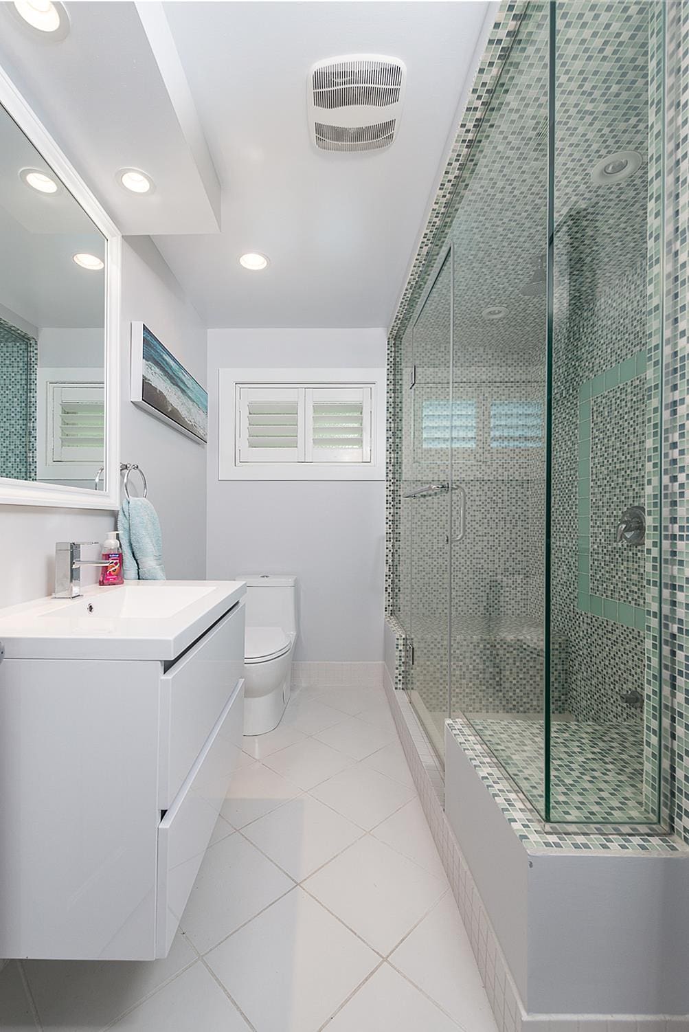 Bathroom with mosaic tile shower