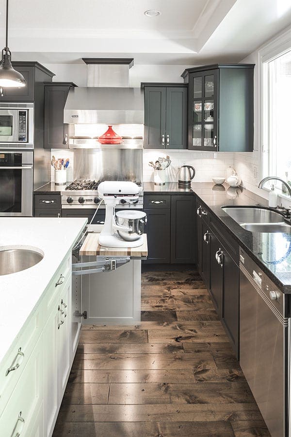 Dark cabinet kitchen with mixer lift