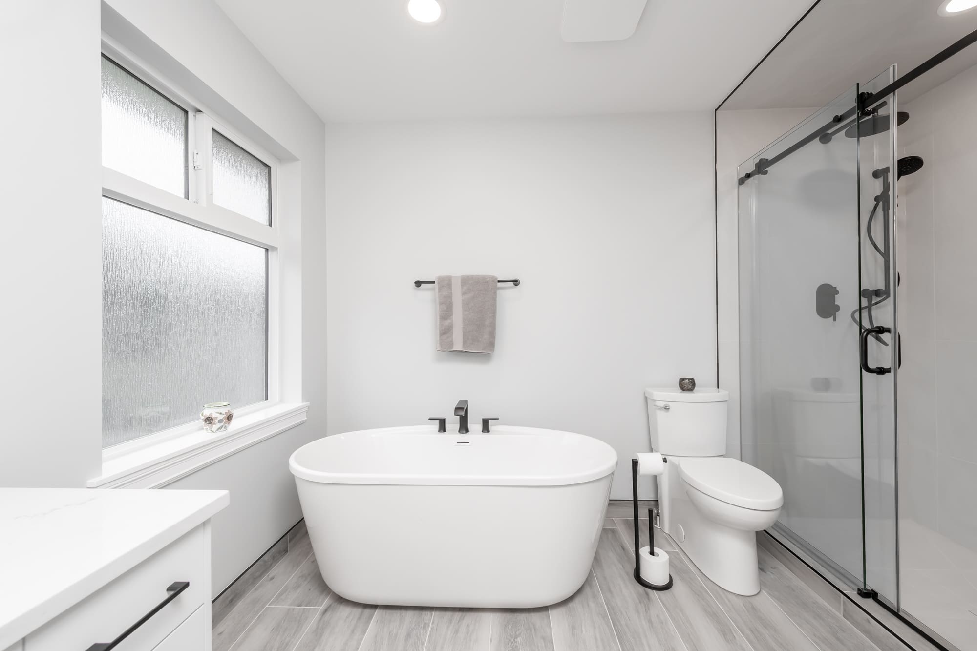 Accessible bathroom renovation with modern age-friendly design features and premium finishes in a Chilliwack home