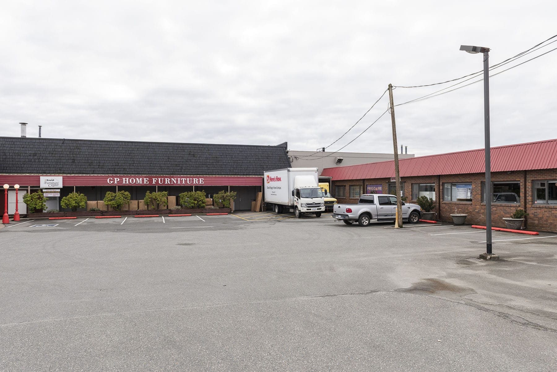 Commercial building exterior painting project by Master Painting showing professional finish on Fraser Valley business property