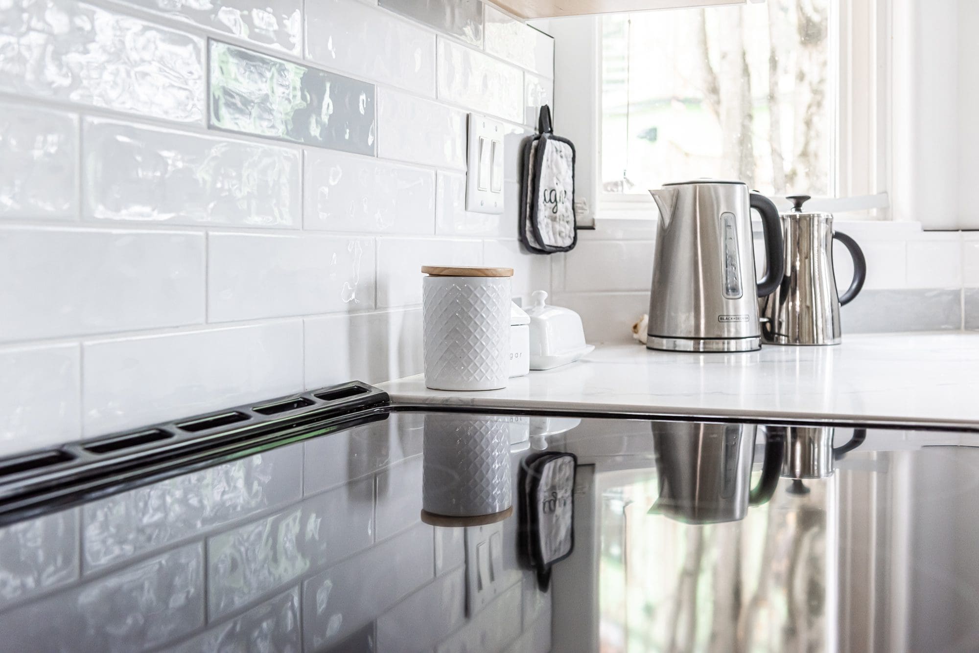 Small space renovation with efficient design, smart storage solutions, and modern finishes in a Chilliwack condo on Young Road