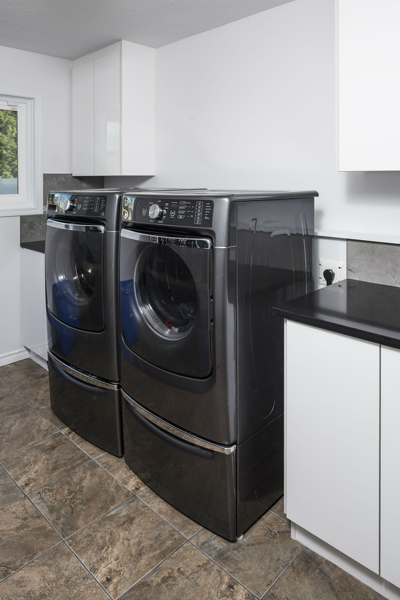 Laundry area with washer and dryer