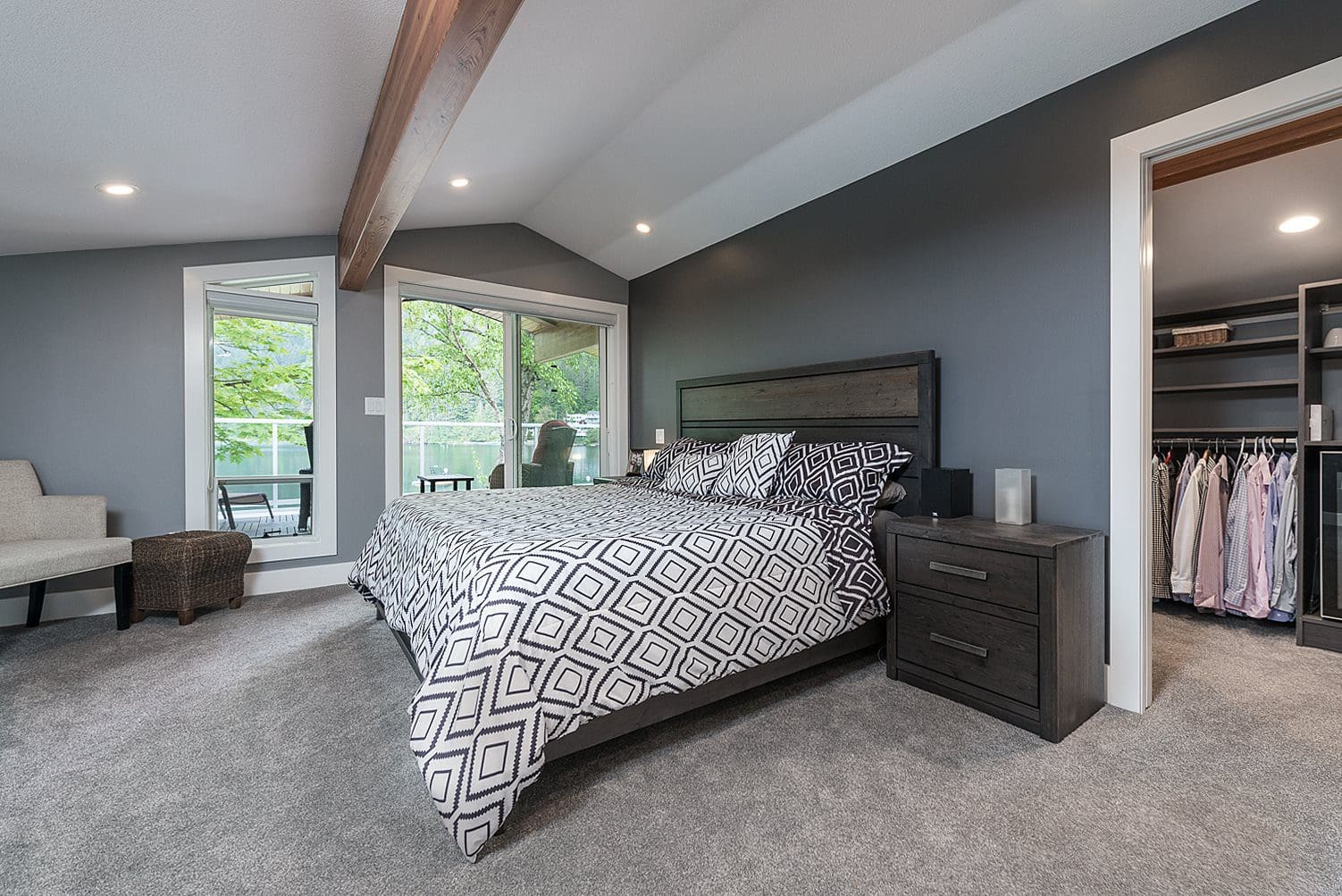 Lakefront master bedroom beam ceiling