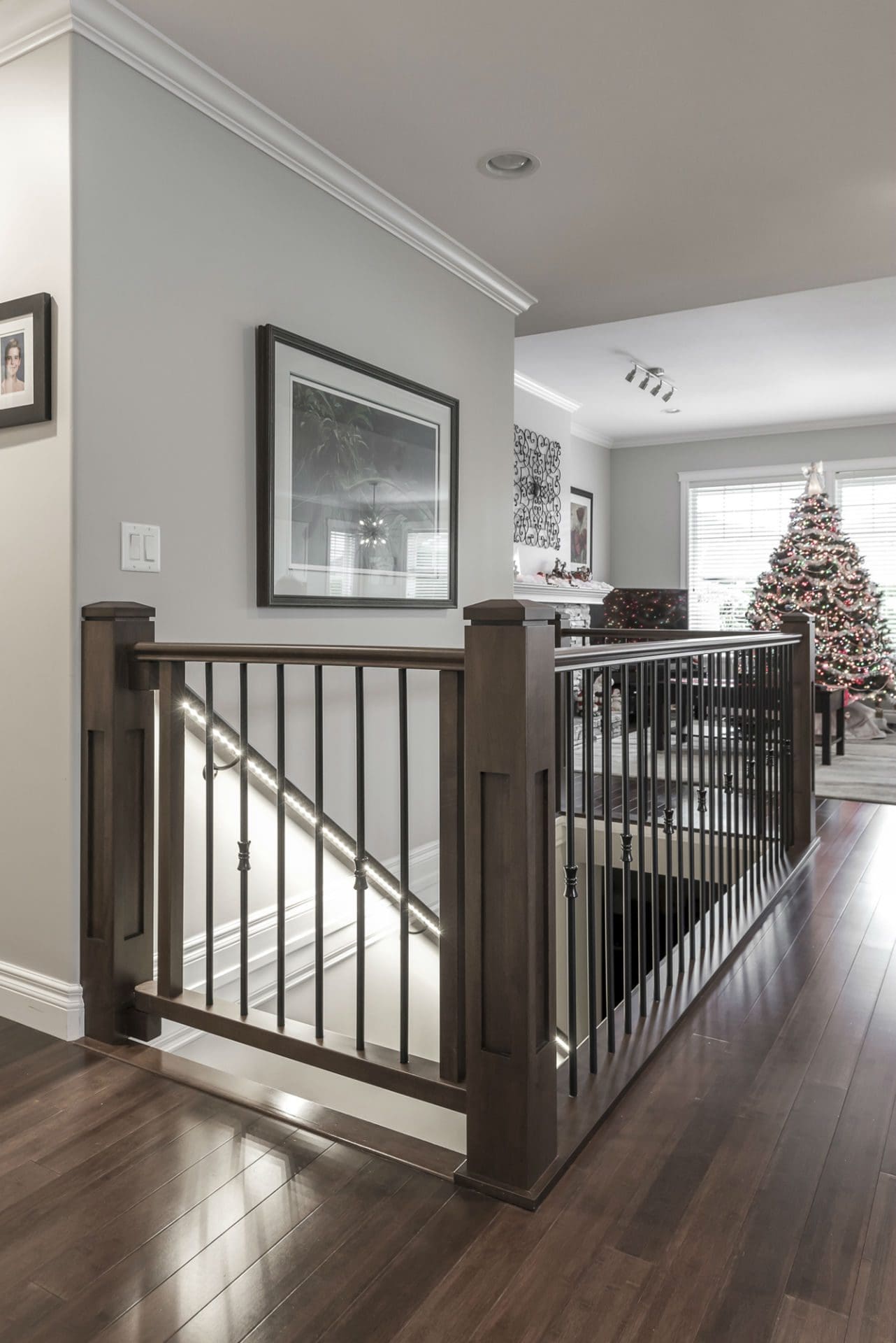 LED lit staircase railing with hardwood floors Chilliwack BC