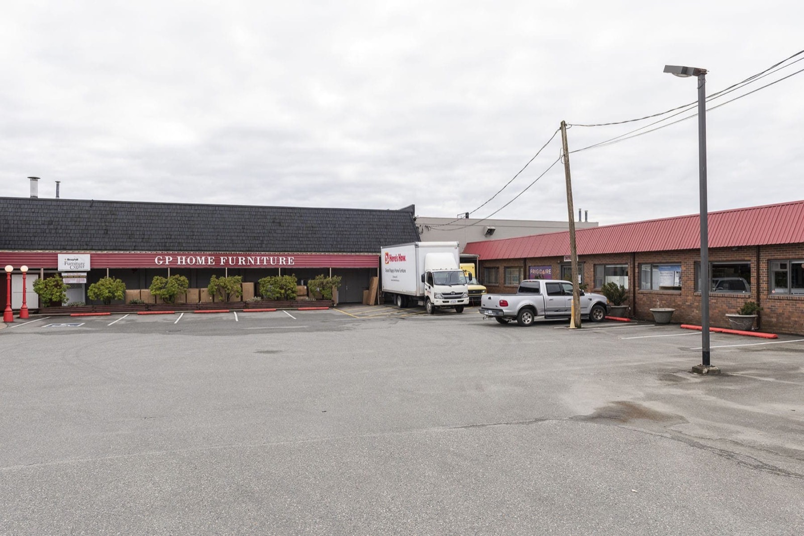 Commercial building exterior painting project by Master Painting showing professional finish on Fraser Valley business property