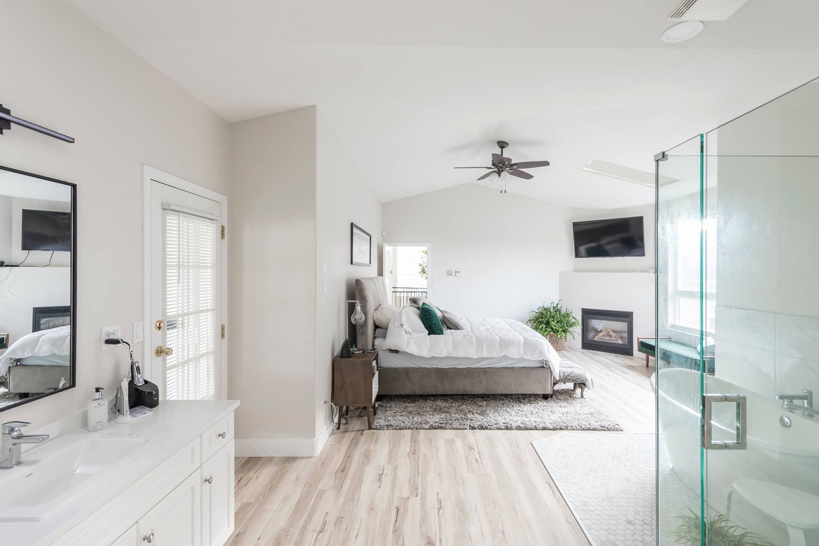 Warm and inviting living room renovation with rich colour palette, modern furnishings, and professional interior painting moving beyond beige in a Fraser Valley home